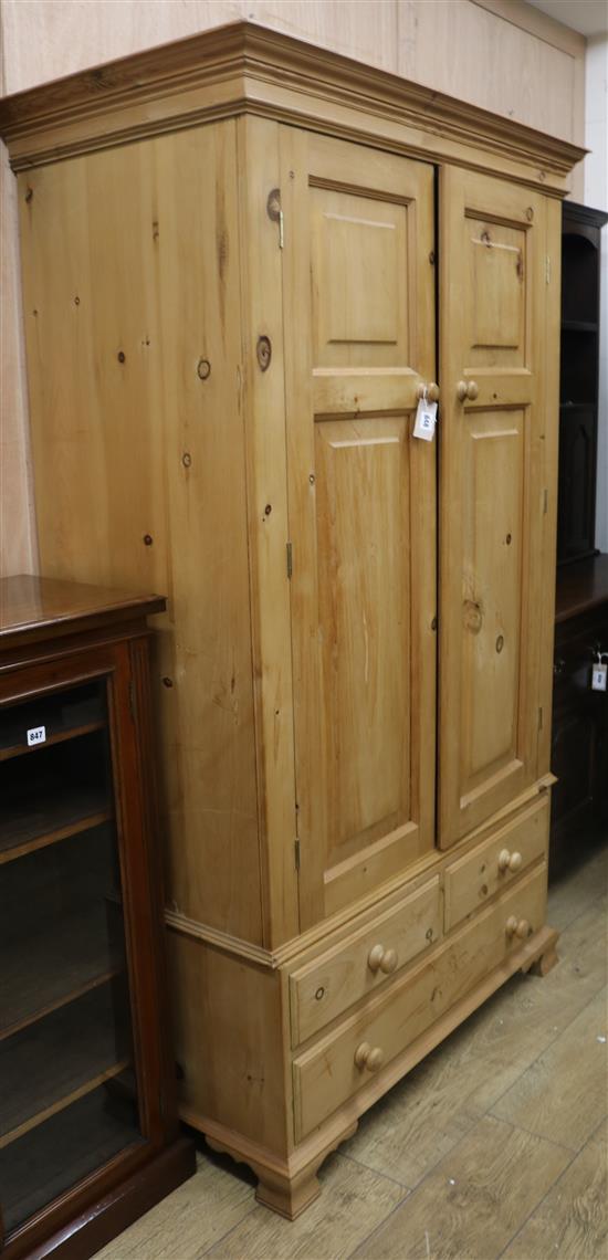 A pine wardrobe W.110cm